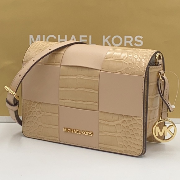 Michael Kors Handbags - MICHAEL KORS MERCER SMALL CLUTCH XBODY BUFF